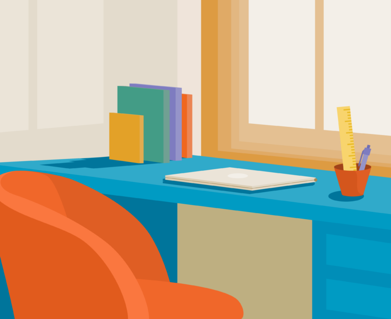 Una silla y un laptop de un ambiente de estudio.