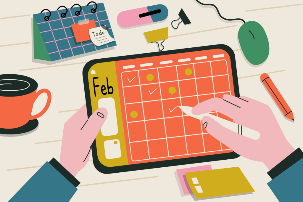 Persona utilizando un lápiz óptico para escribir y definir sus metas en la aplicación de agenda de su tablet.